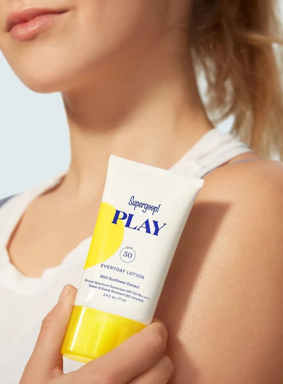 supergoop-play-everyday-lotion-spf-50-with-sunflower-extract-model-with-pack